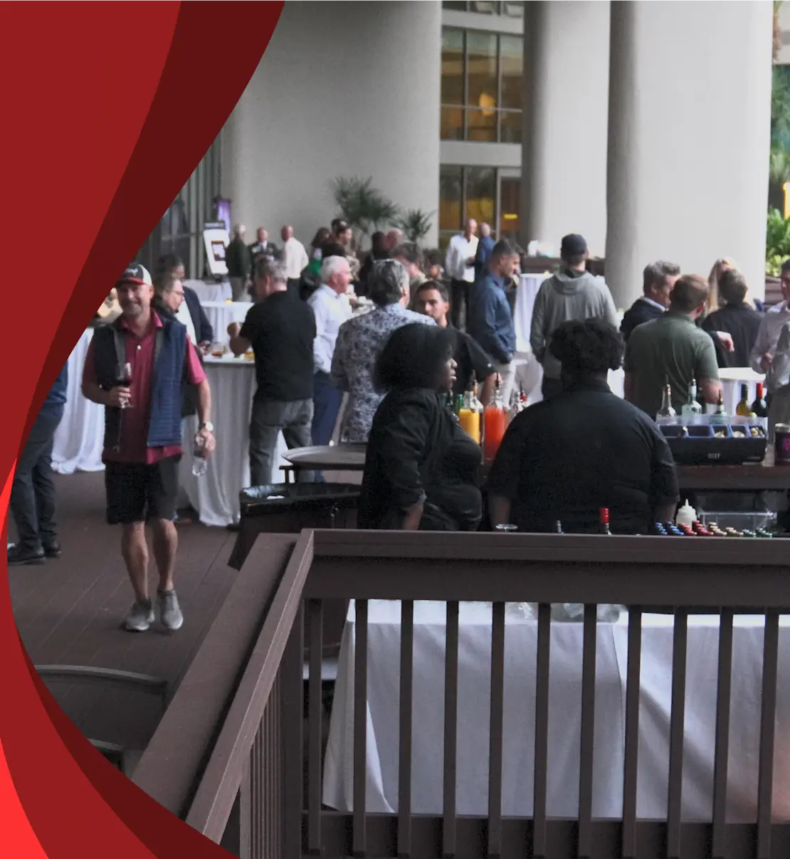 DealerConnect attendees networking during an outdoor resort reception.